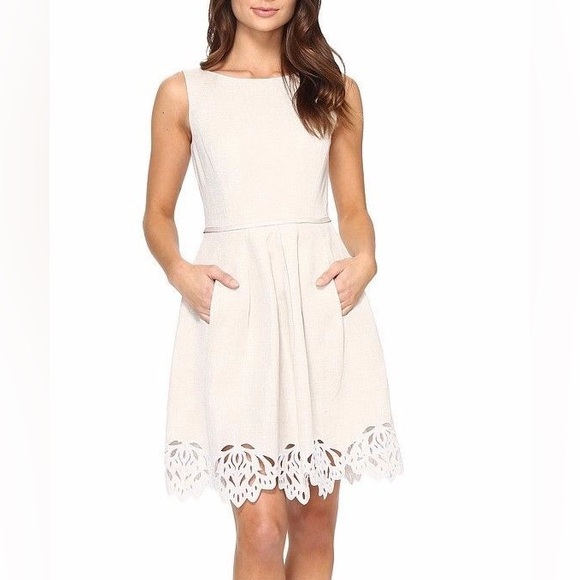 Dresses & Skirts - Chic Sleeveless Cream Dress with Lace Hem